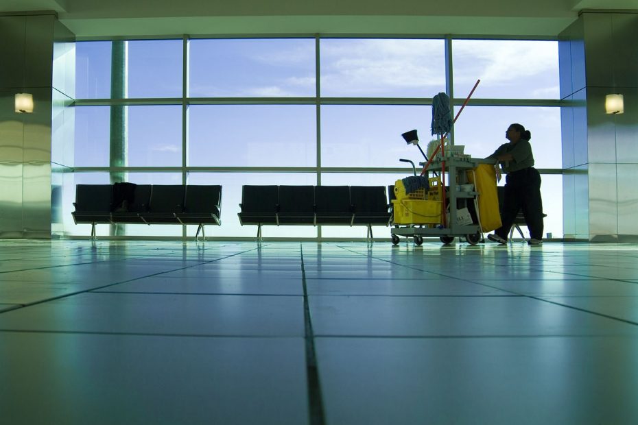 A3P0XF Maintenance Cleaner Janitor Worker Walking By Window At The End Of The Day, Oklahoma City. Image shot 2006. Exact date unknown.